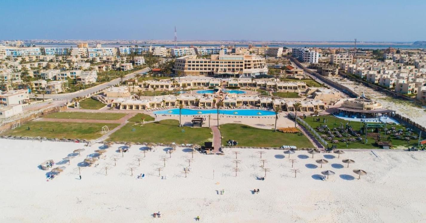 Borg El Arab Beach Resort Dış mekan fotoğraf Aerial view of the resort